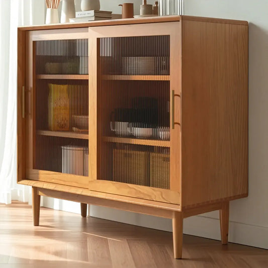 Meuble de cuisine nordique avec portes vitrées et pieds droits