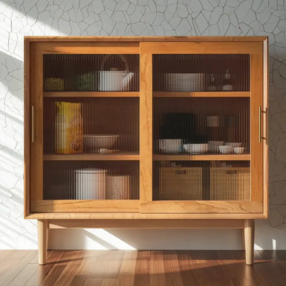 Meuble de cuisine nordique avec portes vitrées et pieds droits