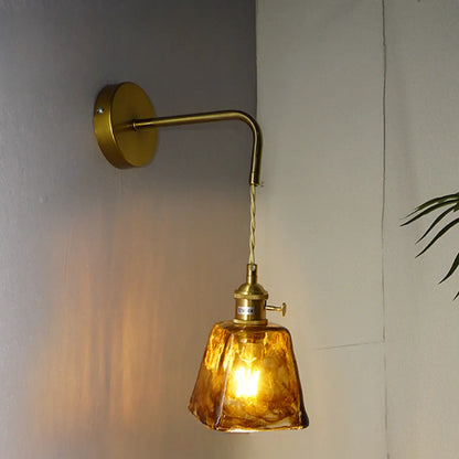 Applique murale vintage à bras articulé avec abat-jour en verre ambré