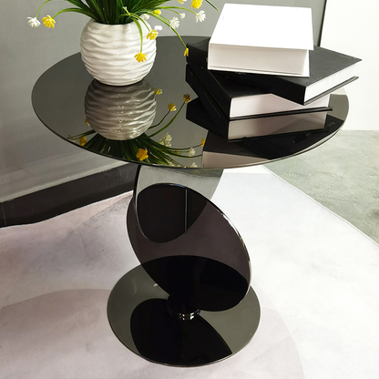 Table basse ronde en verre de style scandinave avec piètement abstrait