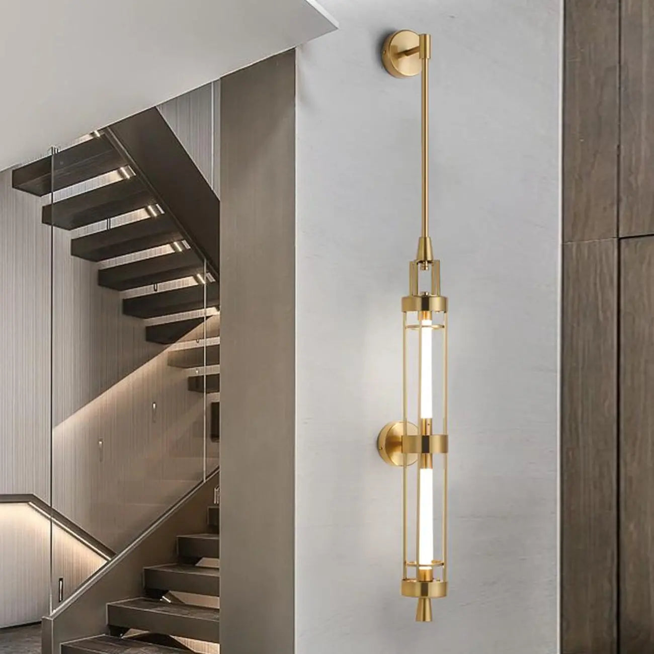 Applique murale cylindrique dorée avec 2 ampoules LED à lumière chaude