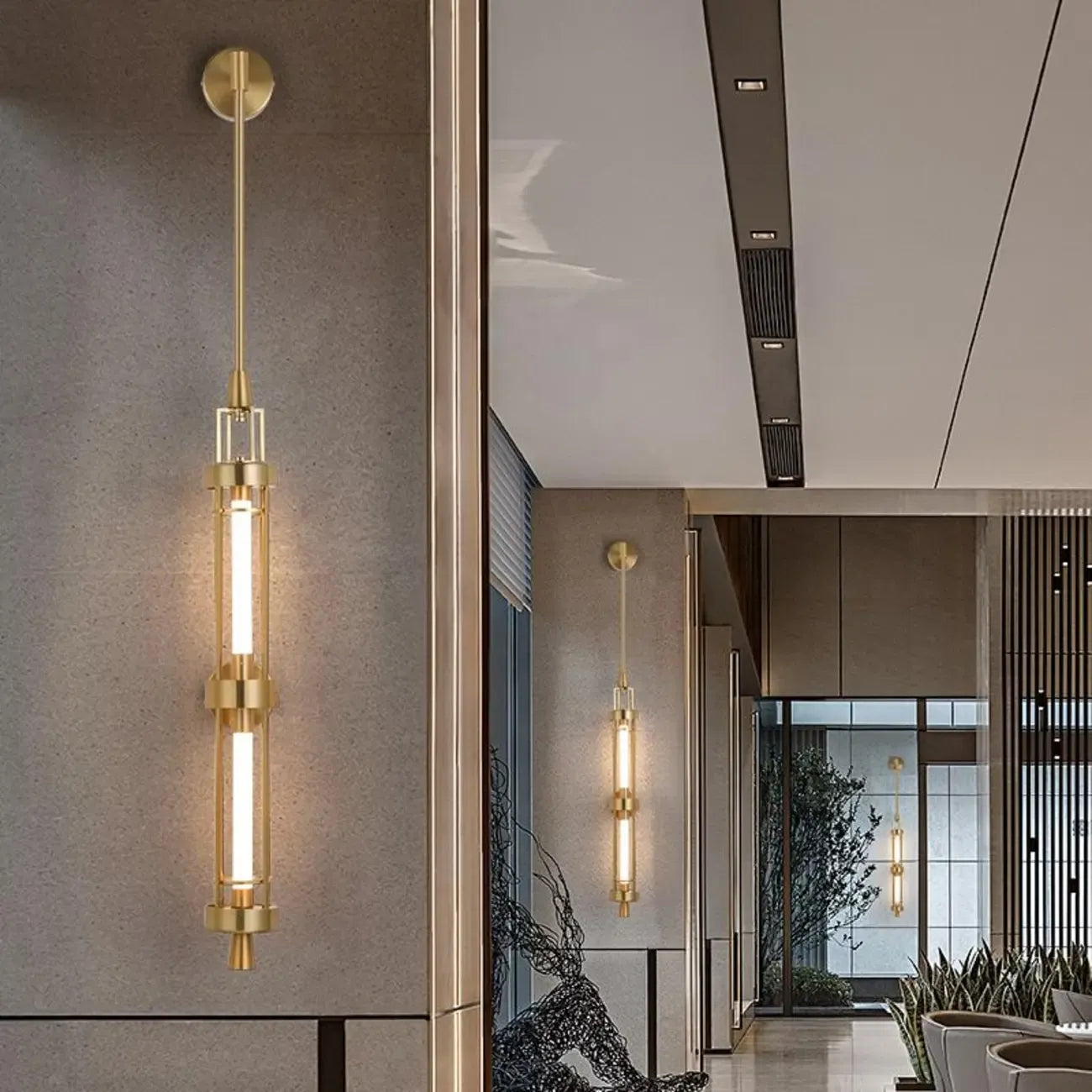 Applique murale cylindrique dorée avec 2 ampoules LED à lumière chaude