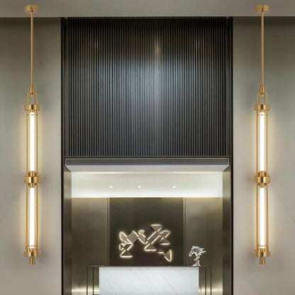 Applique murale cylindrique dorée avec 2 ampoules LED à lumière chaude