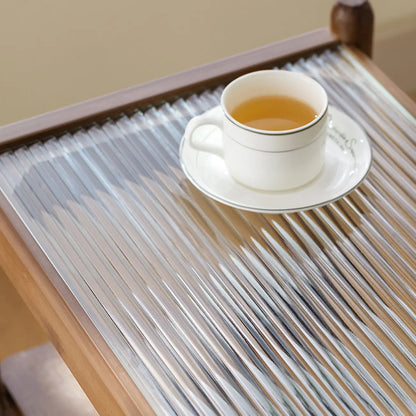 Table d'appoint rectangulaire large avec plateau en verre brun noisette et roulettes