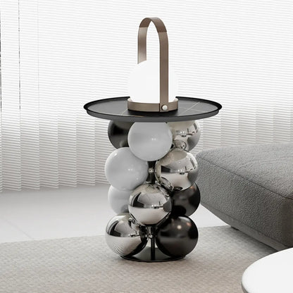 Table d'appoint moderne et artistique sur piédestal en métal avec plateau en pierre