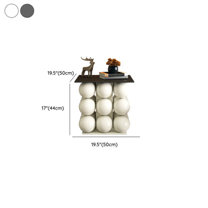 Table d'appoint moderne et artistique sur piédestal en métal avec plateau en pierre