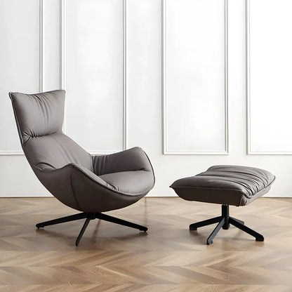 Fauteuil lounge moderne en cuir marron avec repose-pieds