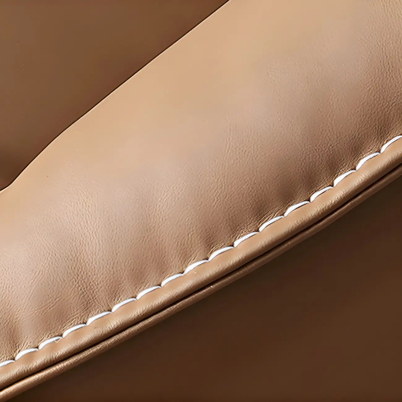 Fauteuil lounge moderne en cuir marron avec repose-pieds