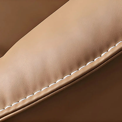 Fauteuil lounge moderne en cuir marron avec repose-pieds