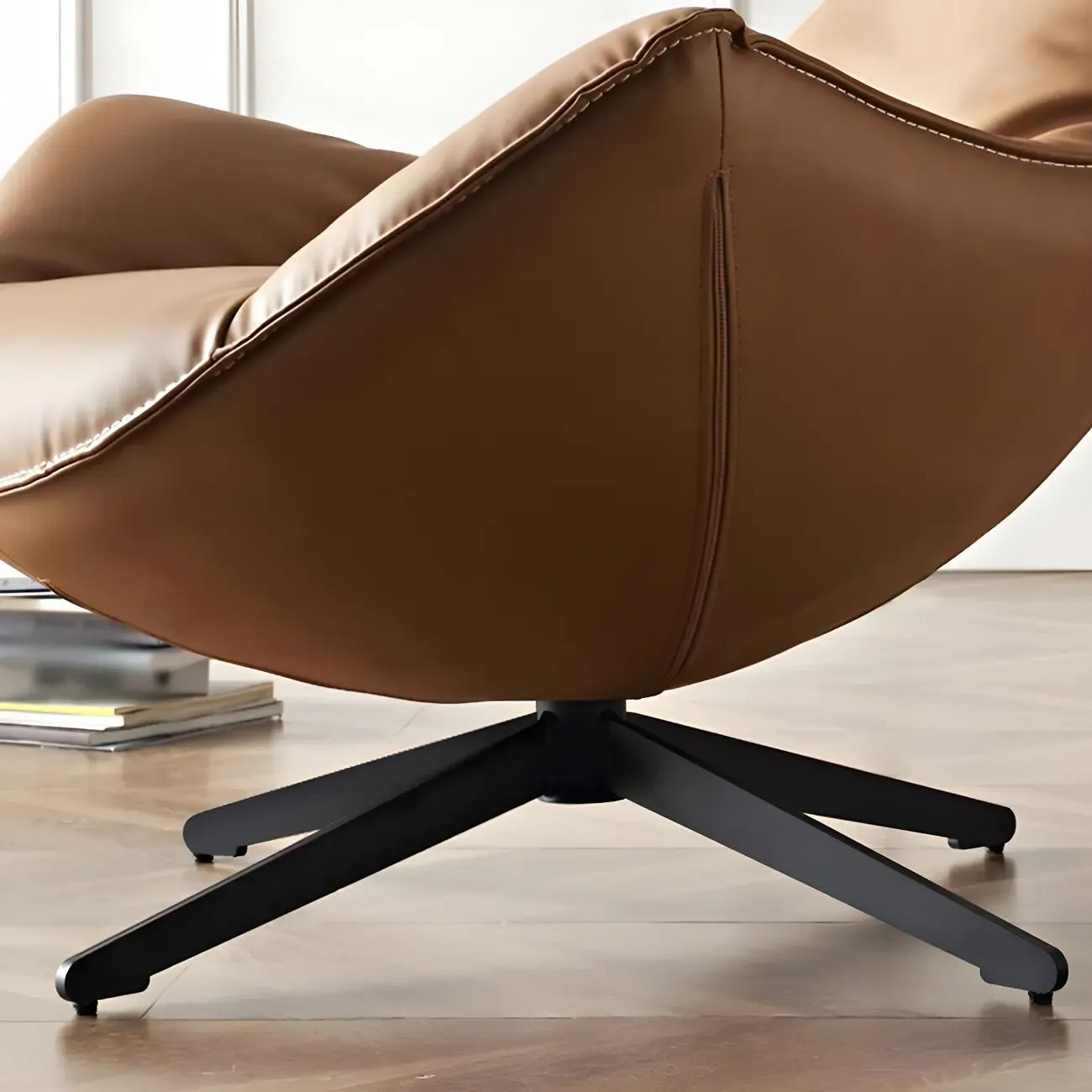 Fauteuil lounge moderne en cuir marron avec repose-pieds